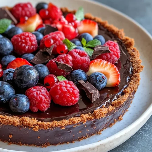 Homemade Chocolate Ganache Tart with Berries photo