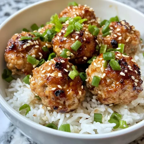 Homemade Sticky Sesame Chicken Meatballs with Rice photo
