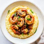 Homemade Cajun Honey Butter Shrimp and Grits photo