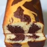 Homemade Chocolate, Dulce de Leche, and Vanilla Marble Cake photo