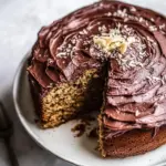 Classic Coconut Banana Cake with Chocolate Frosting. recipe image