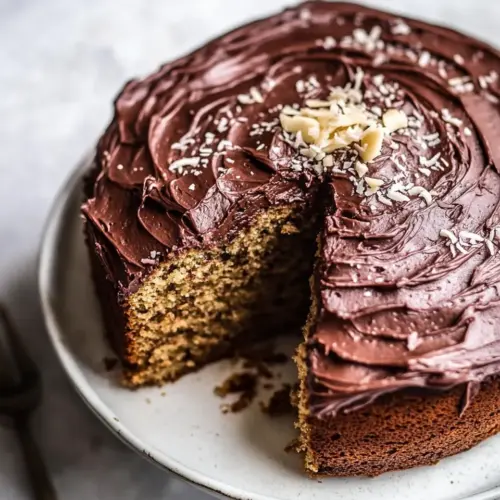 Classic Coconut Banana Cake with Chocolate Frosting. recipe image