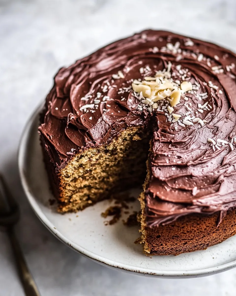 Classic Coconut Banana Cake with Chocolate Frosting. recipe image