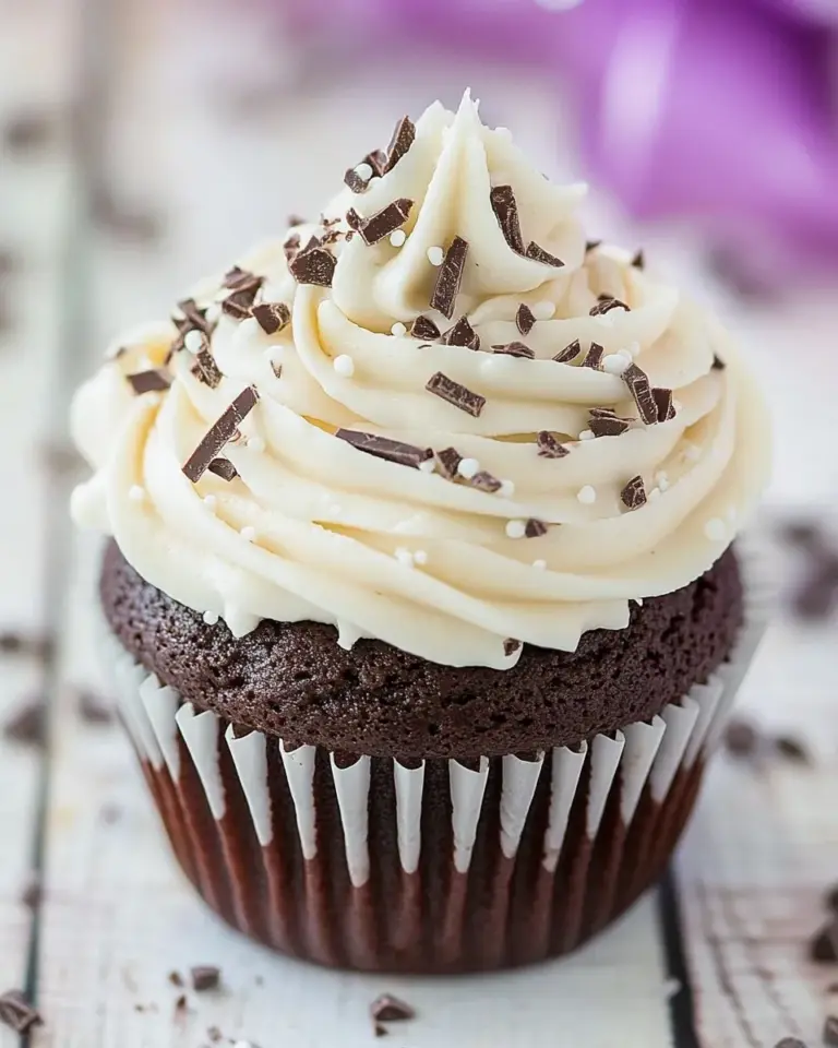 Homemade Dark Chocolate Cupcakes with White Chocolate Frosting photo