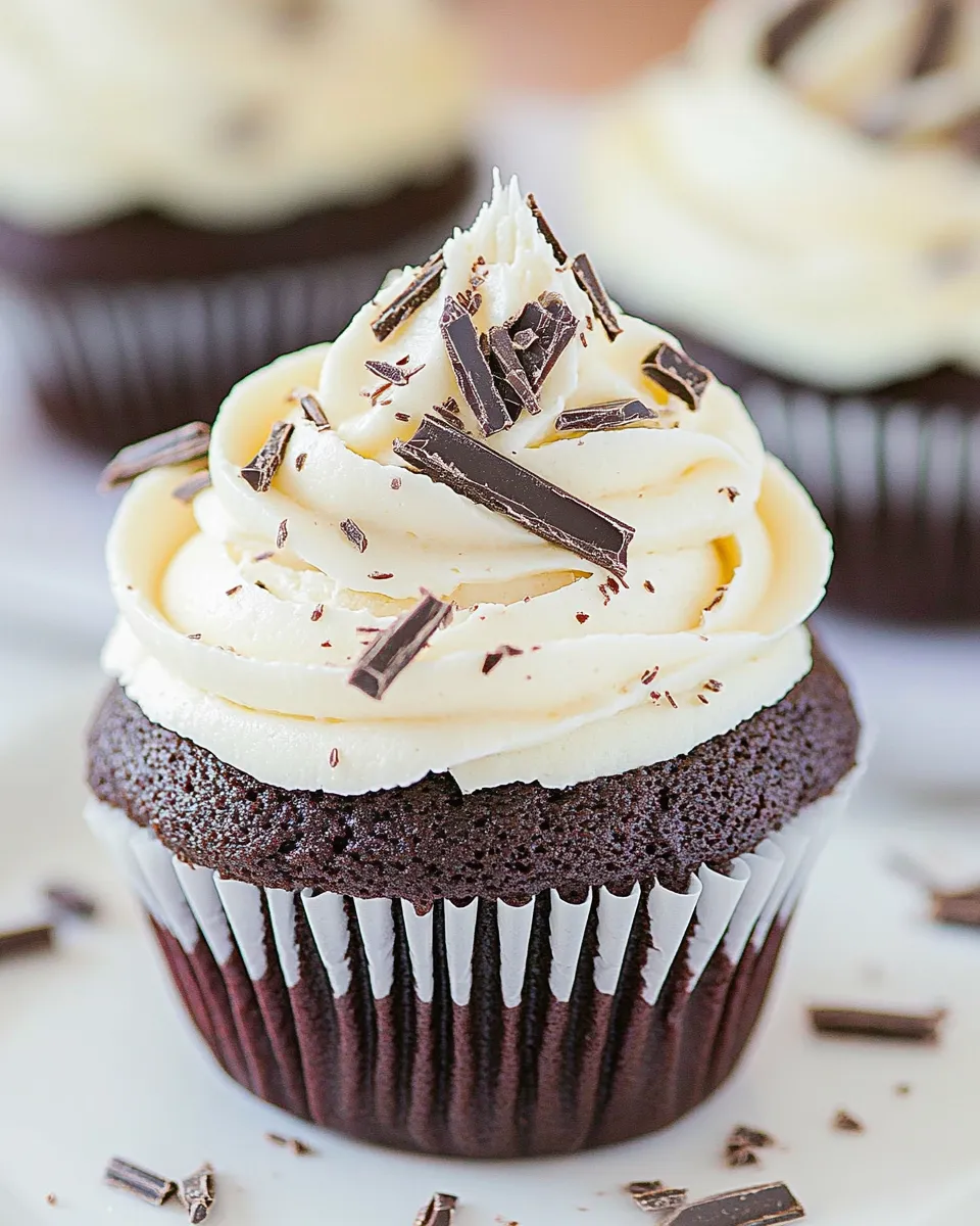 Superb Dark Chocolate Cupcakes with White Chocolate Frosting shot