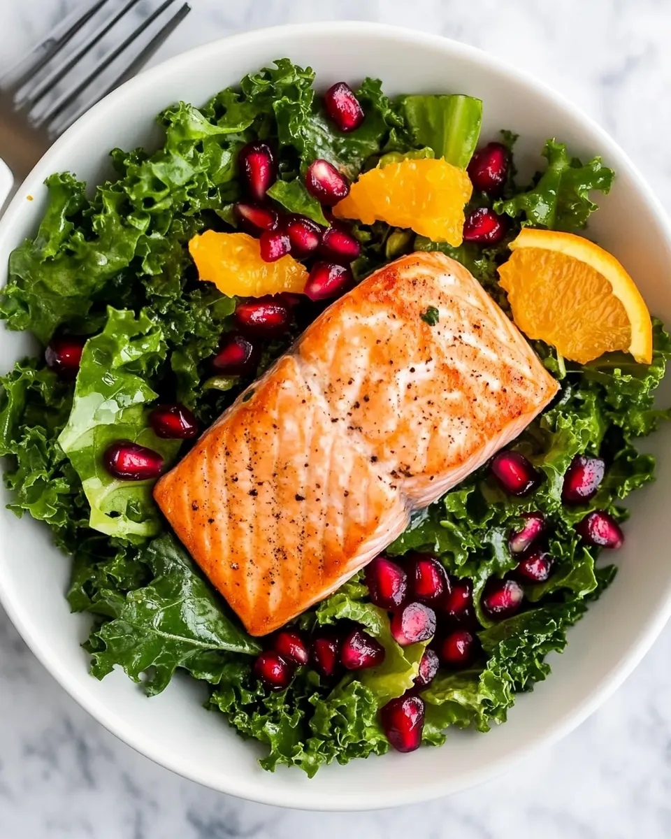 Classic Kale Salad Recipe With Salmon, Pomegranate, And Orange-Coconut Vinaigrette image