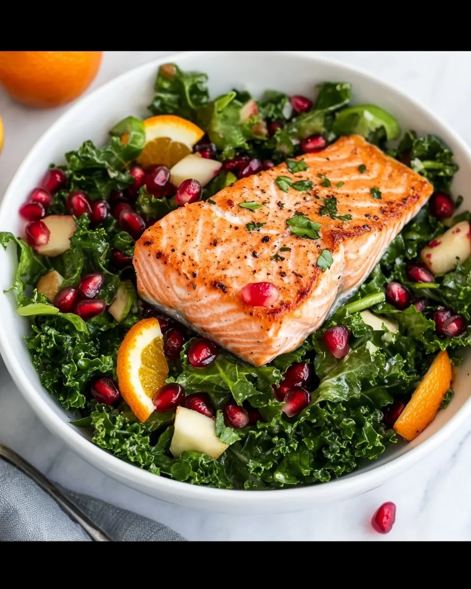 Easy Kale Salad Recipe With Salmon, Pomegranate, And Orange-Coconut Vinaigrette shot